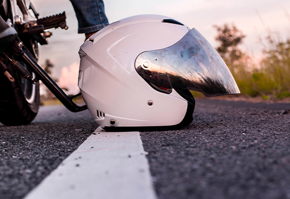 motorcycle accident helmet on road
