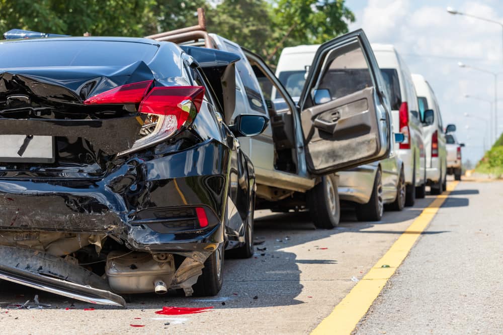 Chain reaction car crash on road