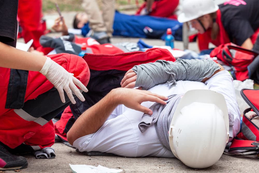 paramedics treating an injured person