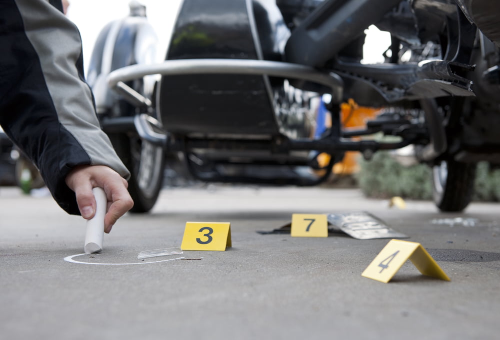 Forensic at a car accident scene