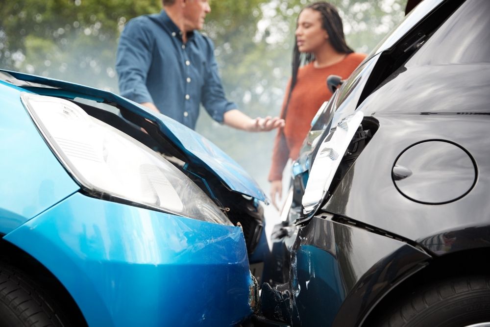Drivers argue after colliding head-on