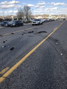 road debris after car accident in St. Louis on sunny day