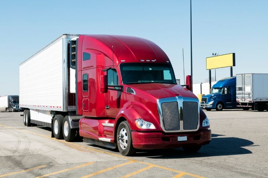 Red truck in parking lot
