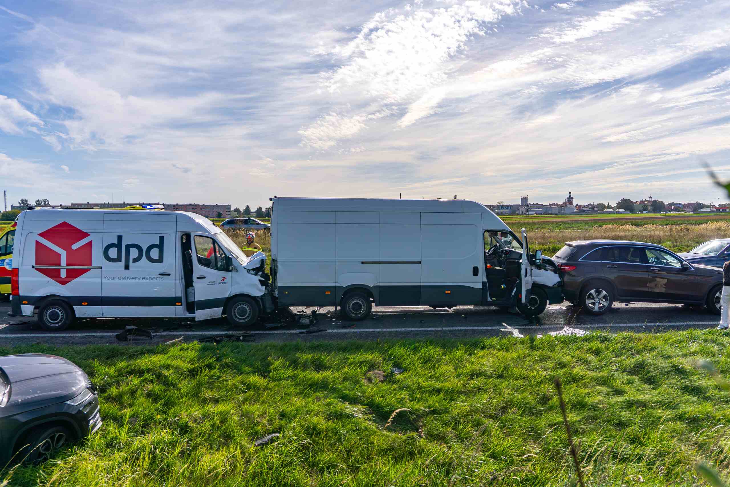 A multi-vehicle crash involving a DPD delivery van, illustrating what to do if hit by a delivery driver in Missouri.